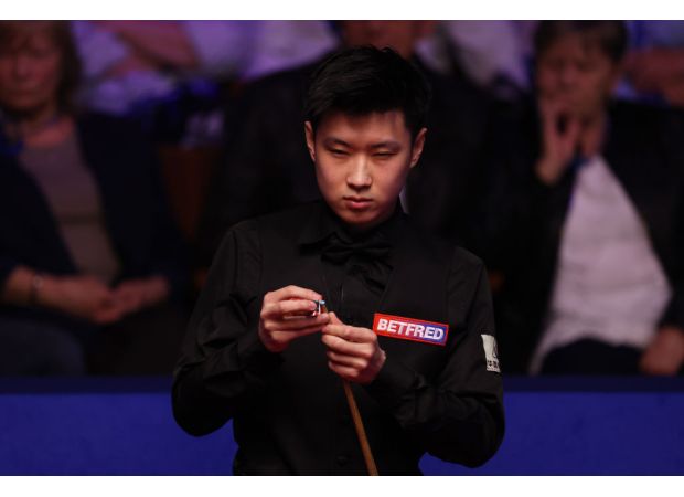 Former match-fixing suspect Zhao Xintong scores record-breaking 147 as he continues to make a comeback in snooker.