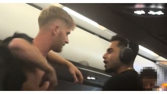 Airline captain pleads with intoxicated passengers in the midst of a fight in the air.