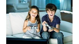 Video games are still primarily aimed at children, according to Reader's Feature writer.