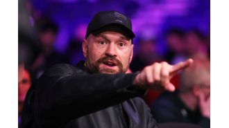 Fury addresses Putin comparison, Woods apologizes for rant.