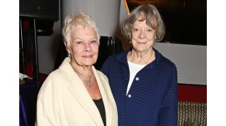Dame Judi Dench becomes emotional when talking about the passing of her friend Maggie Smith.