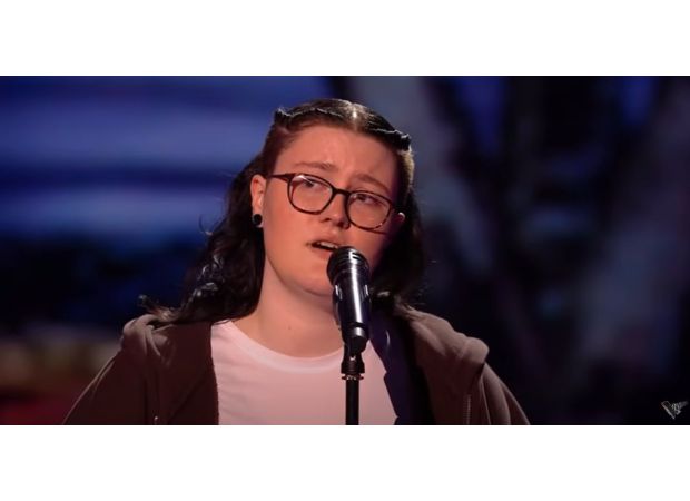 Emotional singer on The Voice UK moves audience to tears with debut performance.