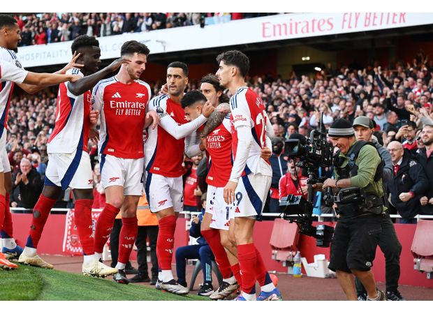 Gary Neville cautions Arsenal following close win against Southampton.