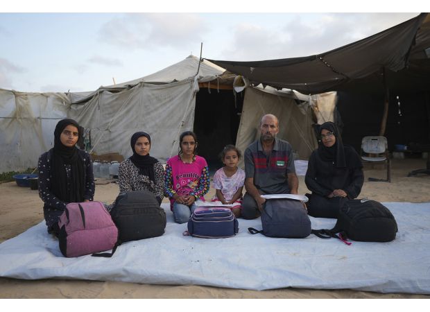 Following a family's journey through multiple moves across war-torn Gaza.