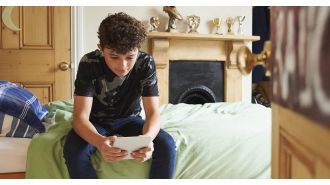 The speaker took away their teenage son's bedroom door and has no regrets.