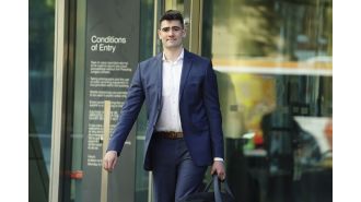 The first person to be charged with violating Nazi salute laws has been found guilty.