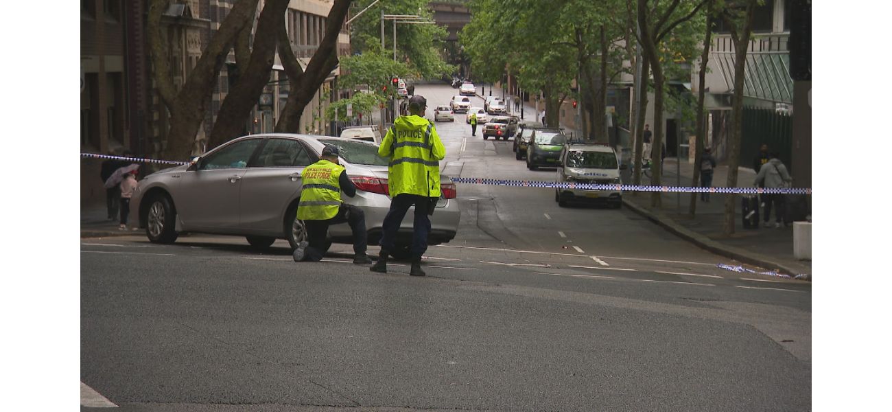 An 82-year-old man was taken to the hospital after being hit by a car in Sydney's central business district.
