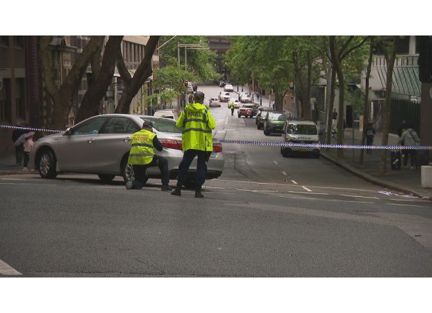 An 82-year-old man was taken to the hospital after being hit by a car in Sydney's central business district.