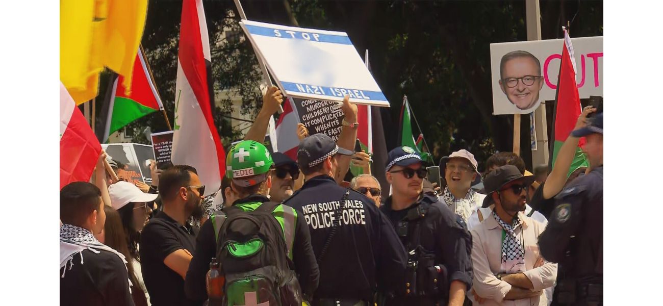 Australian restaurant owner facing charges for displaying a swastika at a protest supporting Palestine.