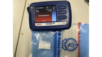 Bike rider stopped for no helmet, found with meth.