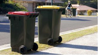 Residents could get fined for putting out trash cans before proper time.