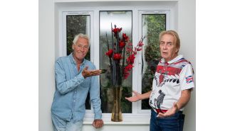 Elderly individuals argue over fake flowers.