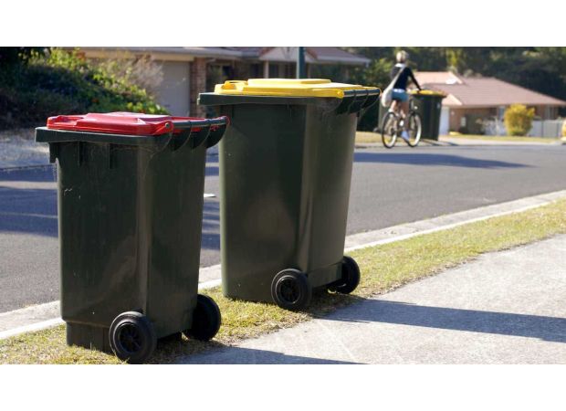 Residents could get fined for putting out trash cans before proper time.
