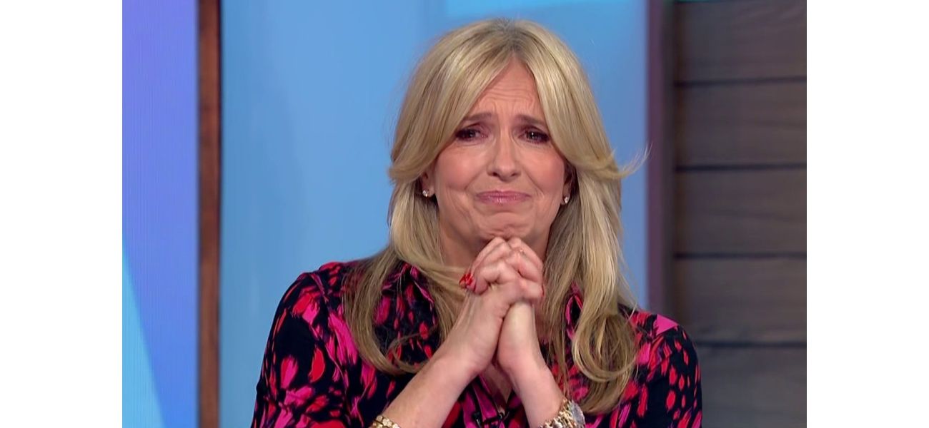 TV show host embraces fellow cast member Penny Lancaster after she cries on air.