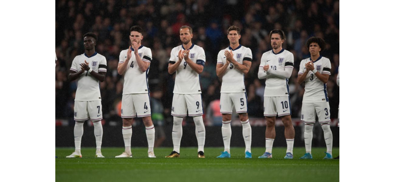 Why are England and Greece wearing black armbands at Wembley tonight?