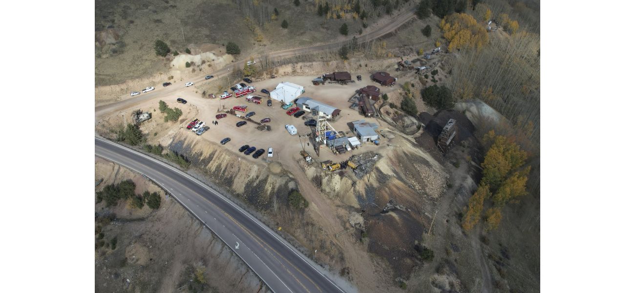 An individual died and 12 others are stuck in a previous gold mine.