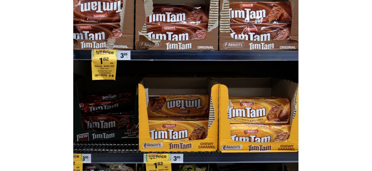 Major Australian supermarkets deny responsibility for expensive Tim Tams.