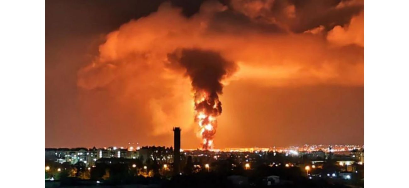 Explosion at Putin's oil refinery causes massive fire with flames reaching 200ft into the sky.