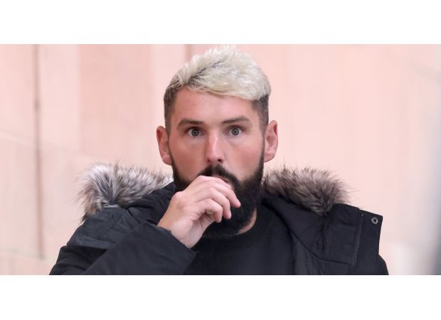 TUI flight delayed due to intoxicated passenger causing disturbance and spilling alcohol on child.