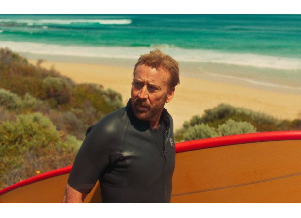 Nicolas Cage has a wild new catchphrase in his latest movie about a gangster who surfs.
