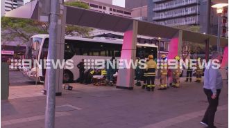 Person reportedly attacks three cops and dog during bus boarding.