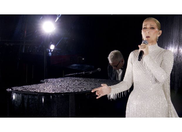 Controversy over Celine Dion's Olympic performance as French musicians accuse her of using pre-recorded vocals.