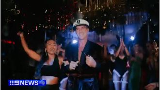 Police in Bali arrest the wife of a former Essendon football player in raids on sex spas.