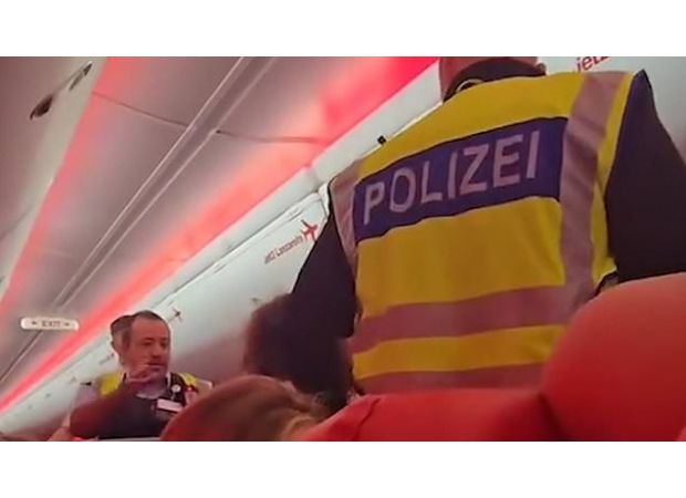 Intoxicated travelers engage in physical altercations and spitting on Jet2 flight.