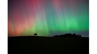 Unusual northern lights seen further south than usual are caused by a geomagnetic storm.