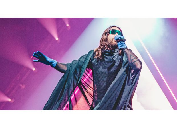 Actor Jared Leto receiving criticism for expressing desire to perform in Moscow despite ongoing tensions between Russia and US.