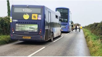 Mother and child in dire situation following collision with school bus in Cornwall.