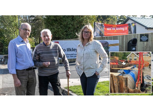 Woman had to build a protective structure due to McDonald's being constructed near her house.