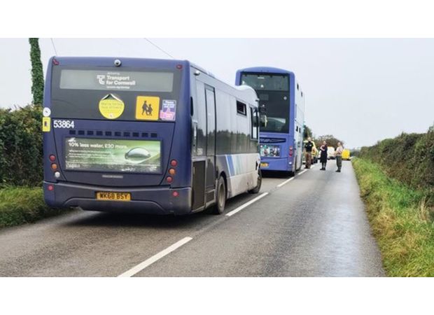 Mother and child in dire situation following collision with school bus in Cornwall.