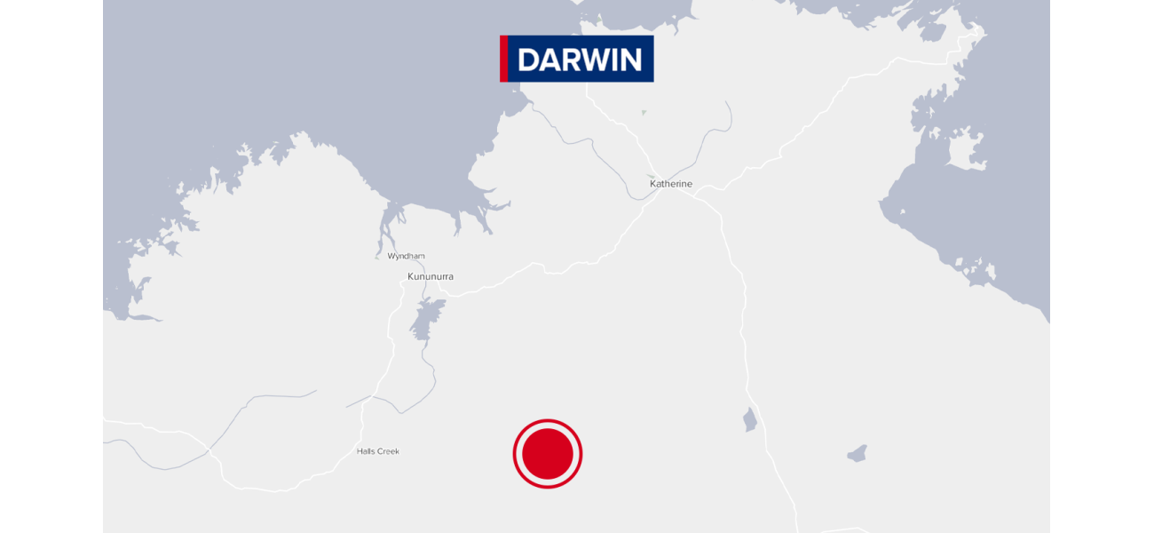 Man detained by police after being accused of killing female in Northern Territory town.