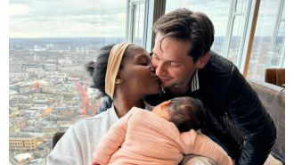 Spouse of famous dancer requested to provide evidence of parenthood for their baby while going through customs.