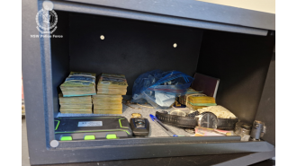Police find large stash of drugs and money during bust