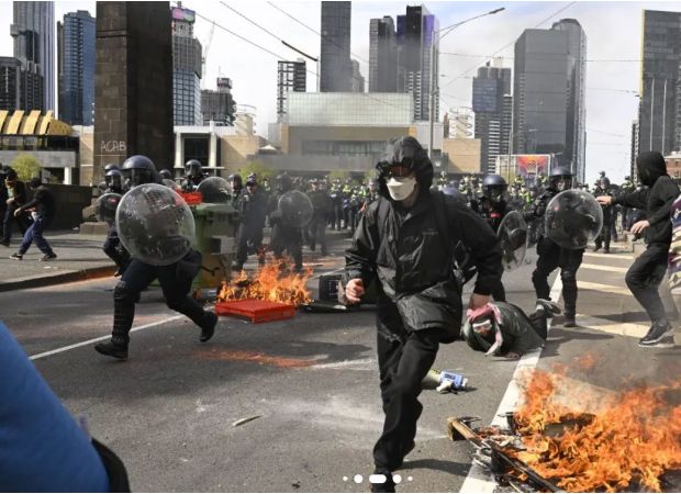 Melbourne man accused of attacking police horse and officers during anti-war rally.