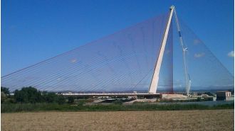 A person traveling for pleasure passed away attempting to scale Spain's tallest bridge for online content.