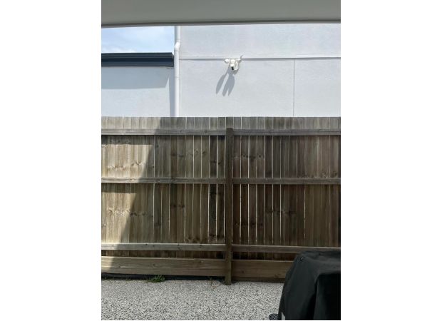 Neighbour puts advanced security cameras in homeowner's yard - is this right?
