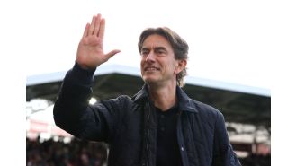 Premier League manager avoids discussing Manchester United rumors.