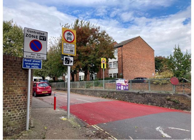 To reduce school traffic, council installs oversized crayons to discourage parents from driving their kids to school.
