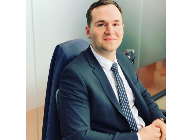 Real estate tycoon with 110 properties at 33 compares housing market to Monopoly game.