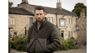 Michael Parr celebrates his return to Emmerdale with his real-life girlfriend, calling it his best year yet.