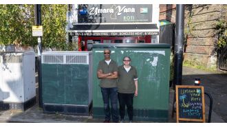 Grandmother battles for 12 years to remove five large boxes blocking her restaurant.
