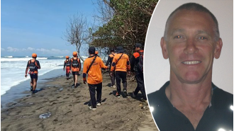 Australian tourist missing after being caught in dangerous waves at Bali beach.