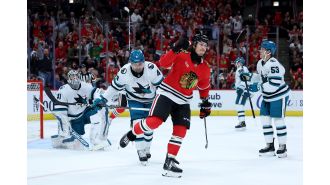 Sharks' penalties and slow start lead to defeat against Bedard and Blackhawks.