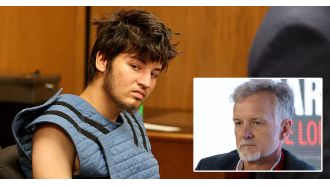The son of a British war photographer is facing charges of murdering his father as he appears in court.