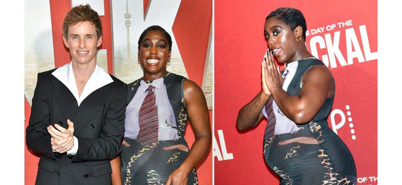 Pregnant first female James Bond rocks baby bump in fashionable appearance.