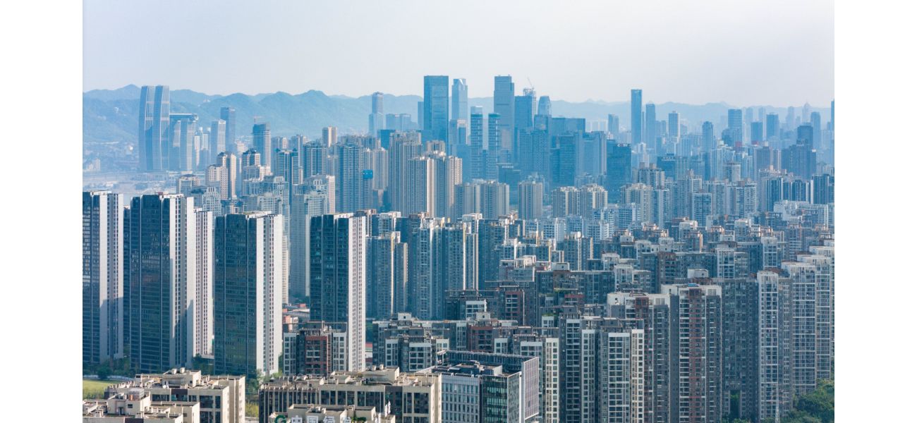 A city with a multitude of skyscrapers and no visible ground floor creates an optical illusion.