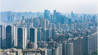 A city with a multitude of skyscrapers and no visible ground floor creates an optical illusion.